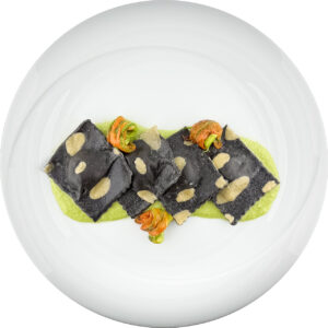 Black-ink raviolo stuffed with salted cod and white wine sauce